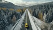 Concept of auto travel during winter holiday season. One yellow car is driving on snow along mountain road near forest. Aerial view. Road trip journey. Generative AI. Drone landscape.