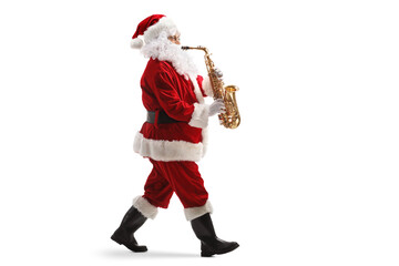 Canvas Print - Full length profile shot of Santa claus walking and playing a sax