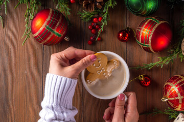 Wall Mural - Gingerbread man in a hot chocolate mug