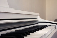 Elegance Upright Piano. Classic Piano Keyboard With Black And White Keys. Musical Image Close Up