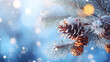 Christmas snowy winter holiday celebration greeting card - Closeup of oine branch with pine cones and snow, defocused blurred background with blue sky and bokeh lights and snowflakes.