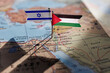 Israel and Palestine flags on geopolitical Map. Gaza strip and West Bank. War conflict