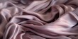 © Fotograf - A detailed close up shot of a beautiful pink silk fabric.