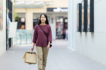 Sticker - Woman hold with shopping bag in the mall