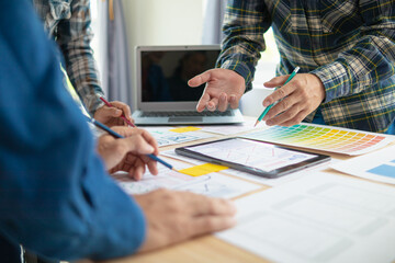 Wall Mural - the designer team is designing the uxui system to make the uxui system work well on new phones and s