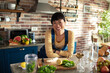 © Marko Geber - Portrait of a smiling female nutritionist in the kitchen