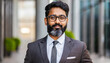 © AustinSANC - Proud confident bearded indian business man investor, rich ethnic ceo, corporate executive, professional lawyer banker