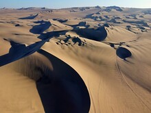 Peru, Ica, Huacachina Desert Between Sandy Dunes, Aerial View From Drone
