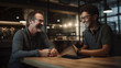 © javier - A tech-savvy client discussing software solutions with a tech company representative both sharing smiles over innovative ideas.