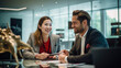 © javier - A couple meeting with a travel agency representative in a welcoming office all smiles as they plan their dream vacation.