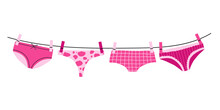 Underwear On Rope. Girly Lingerie. Washing And Drying Outdoors. Underpants Attached With Clothespins To Laundry Cord.