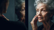 © dinastya - Elderly woman looking in the mirror. Creative concept of old age, retirement, aging skin and wrinkles. Reflection in the mirror of older woman.