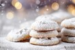 A touch of love is added to these cookies with a dusting of powdered sugar, creating an ethereal effect reminiscent of a gentle snowfall.