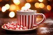 A traditional red and white striped candy cane adorns the rim of a steaming hot cocoa mug, slowly melting with each sip, infusing the rich chocolatey goodness with a delightful burst of