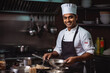 © VisualProduction - Handsome young indian male personal chef focusing on his job, wearing a cooking uniform, successful business man at work in the kitchen