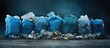 Trash filled blue bins on the ground alongside plastic bags