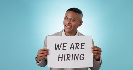 Canvas Print - Hiring poster, advertising job and black man with human resources for recruitment at company on blue background. Portrait, onboarding and work opportunity with sign in studio, business and offer