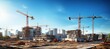 © Hero Design - Building construction sites development and tower cranes. Generative AI technology.