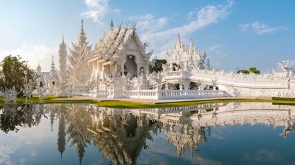 White temple Chiang Rai during sunset, view of Wat Rong Khun or White Temple Chiang Rai, Thailand