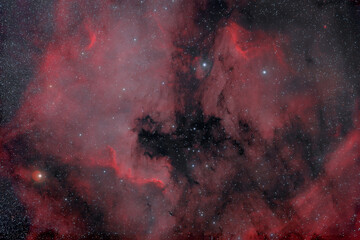 Wall Mural - photograph of real space through a telescope. foggy objects. lots of small stars all over the frame.