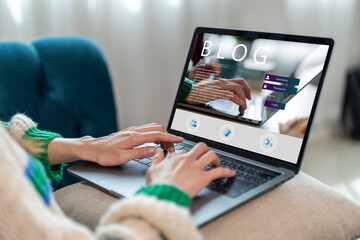 Social media online content, freelance worker, working online, content creator, woman using laptop, woman reading blog online on computer at home.