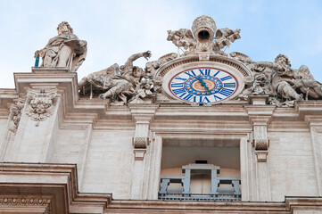 Wall Mural - Fragment of Basilica of St. Peter in the Vatican and column on Saint Peters square in Vatican