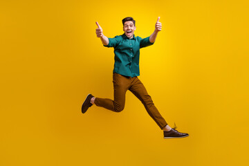 Sticker - Photo of cheerful nice man dressed trendy outfit run hurry black friday sale recommend cool product isolated on yellow color background