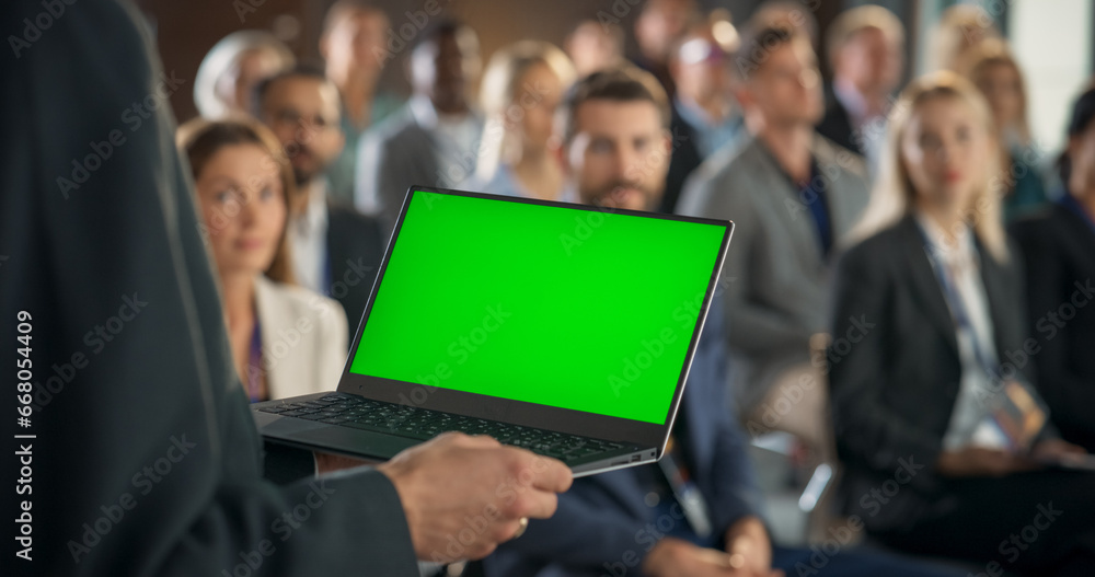 Back View, Focus on Hands Of Startup CEO Holding Laptop With Green ...