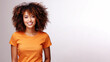 © pariketan - Afro american woman wearing orange t-shirt isolated on gray background