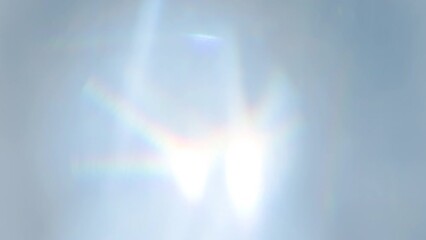 Wall Mural - Rainbow Overflow of Glare. Loop. The light passes through the facets of a slowly rotating diamond and creates repetitive sparkling highlights and rainbow colors