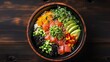 Top view of an Asian poke bowl on a black plate featuring salmon avocado radish corn seaweed peas nori daikon and sesame seeds in a cafe or restaurant