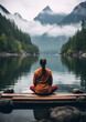 Woman meditating at a lake