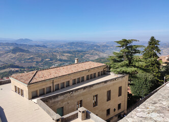 Wall Mural - San Marino city view. Stone street and old walls in San-Marino, Italy.