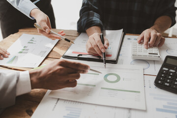 Wall Mural - They are calculating the taxes they have to pay, Numerical data is being presented for the accountant to calculate, They are having a meeting about the company's income and expenses, calculate idea.