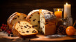 Italian Panettone with raisins and dried apricots on a wooden table, traditional Christmas pastry