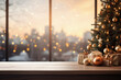 Wooden table with Christmas tree and gift boxes on background of blurry cityscape.