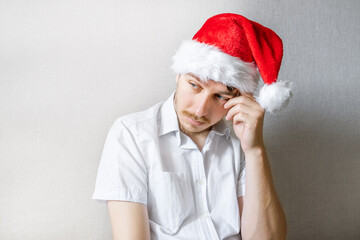 Sticker - Sad Young Man in Santa Hat