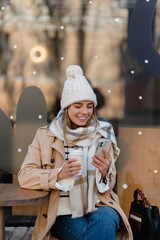 Wall Mural - stylish woman walking in winter street