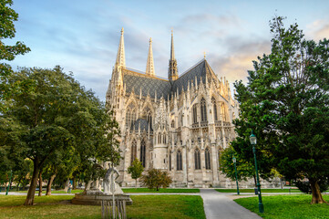 Wall Mural - Votivkirche or Votive Church in Vienna, Austria. Famous Neo-Gothic church on Ringstrasse - second-tallest church in Wien. Church consecrated in 1879 on occasion of Imperial Couple's Silver Wedding.