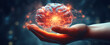 © LeManna - Man's hand holds health human brain