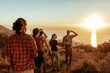 © Marko Geber - Group of Friends Admiring Sunset After a Coastal Hike