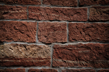 Fototapete - Background with rustic old stone wall pattern. Rough warm sand stone texture. Close-up.