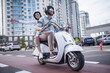 Couple on scooter