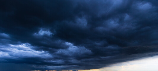 Aufkleber - Bad or moody weather sky and environment. the dark sky with heavy clouds converging and a violent storm before the rain. carbon dioxide emissions, greenhouse effect, global warming, climate change.