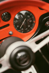 Wall Mural - Vintage dashboard with various gauges on a retro car