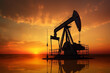 © MaxSafaniuk - Oil drill rig and drilling derrick. Crude oil Pumpjack on oilfield on sunset. Fossil crude extraction. Global crude oil Prices, petroleum demand OPEC+. Oil prices on global market. Pump jack, oilfield