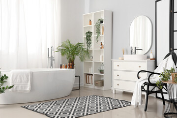 Canvas Print - Interior of bathroom with bathtub and accessories