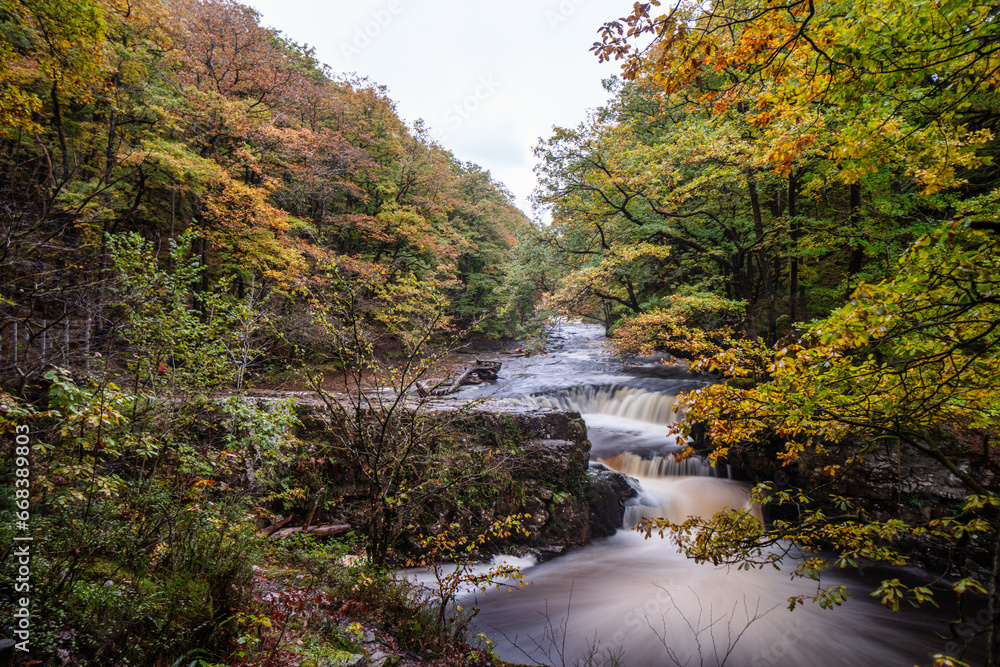 Sgwd y Bedol, meaning 'horseshoe falls', is a series of three ...