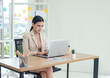 © Singh - Business woman portrait Asian one person wearing suit brown, pretty girl cute smart smile sitting chair on desk looking notebook ready for call center working job online sale inside the home office