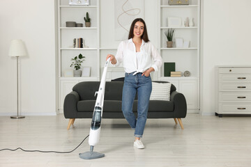 Sticker - Happy woman cleaning floor with steam mop at home